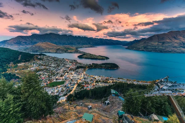 beautiful-sunset-sky-over-illuminated-queenstown-w-2025-03-24-22-23-11-utc